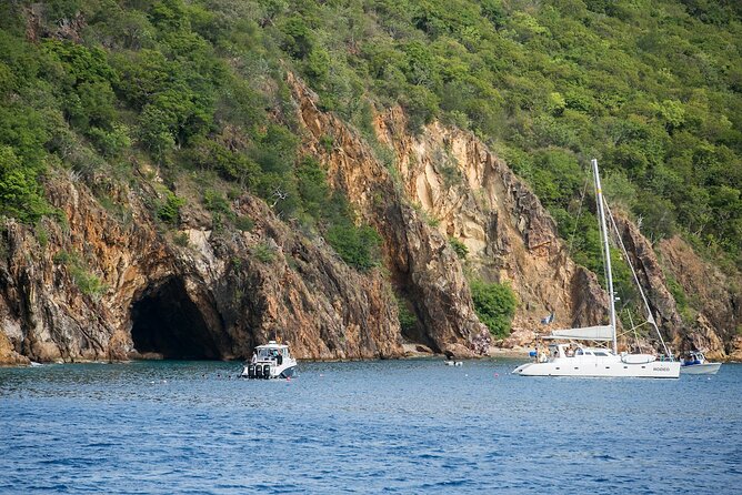 Discover The Baths of Virgin Gorda Full Day Adventure - Ritz Carlton St. Thomas - Treasure Point Caves: legend, rocky paths, and snorkeling time